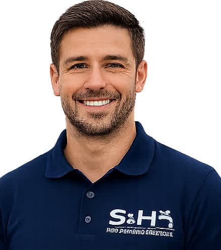 Smiling man in navy polo shirt with Sobowebdesign logo.